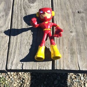 It’s Metal and rubber toy and really flexible 🙂